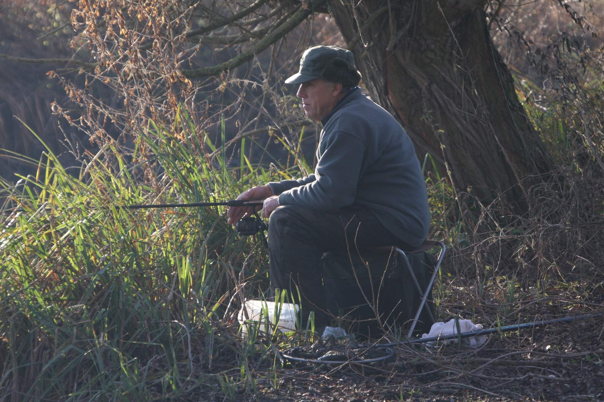 Man fishing beside the Holybrook