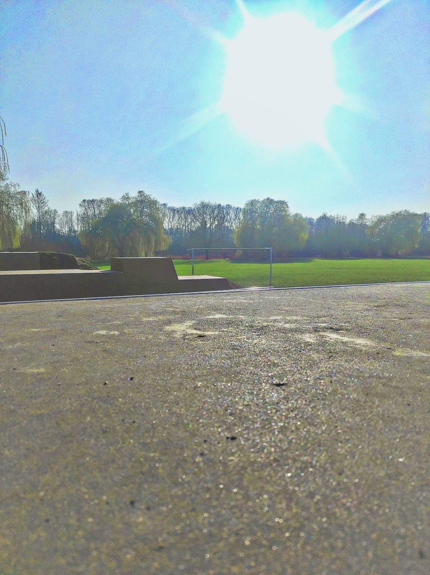 Sunny view of basketball court in Linear Park